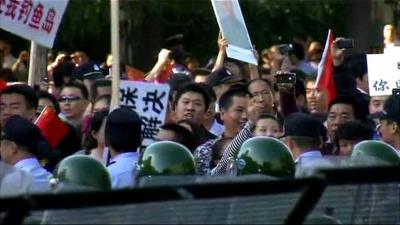 Protesters gathered outside the Japanese embassy in Beijing