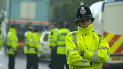 Police officer at the scene in Greater Manchester