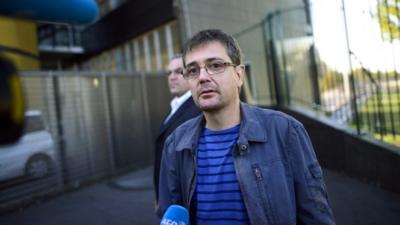 Stephane "Charb" Charbonnier, editor of Charlie Hebdo, answers questions in Paris, 19 September