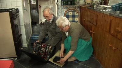 Pensioners on kitchen floor