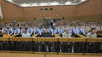 The defendants on trial in Kunming, 20 September