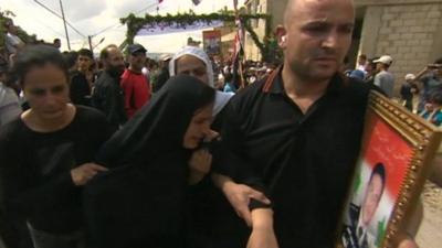 Widow of fallen soldier in the village of Addalia