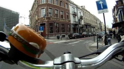 A bike with plastic hamburger bell