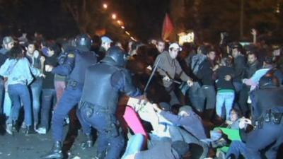 Police clashing with protesters