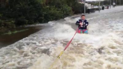 Oli Barrett being towed along Lock Lane in Castleford