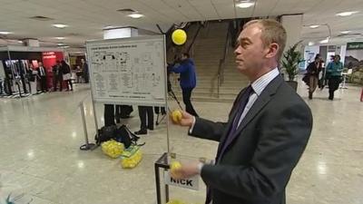 Tim Farron gets ready to vote