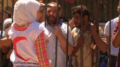 People queuing for humanitarian aid