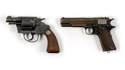 Bonnie Parker .38 Colt Detective Special revolver (L) and Clyde Barrow 1911 Army Colt .45 pistol
