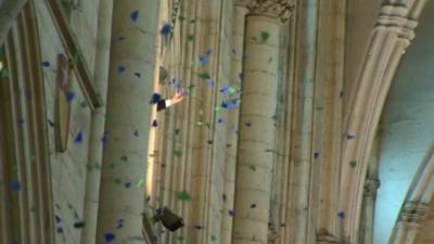 Petals fall during church service