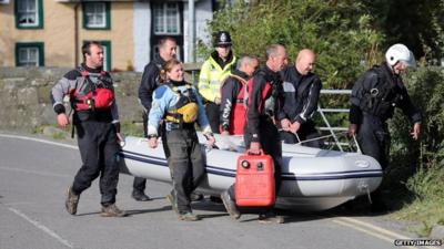 Search team with boat