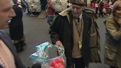 Tony Benn prepares to vote in mood box