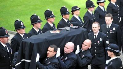 Coffin of PC Fiona Bone is carried into Manchester Cathedral