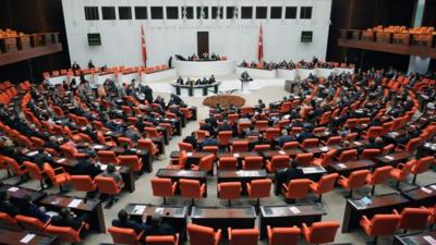 Turkey's lawmakers debate in parliament in Ankara (4 Oct)