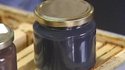 Blue honey in jar