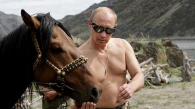 Shirtless Putin with horse