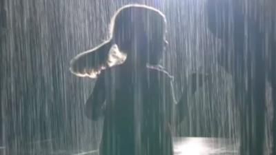 Child visiting the Rain Room at the Barbican