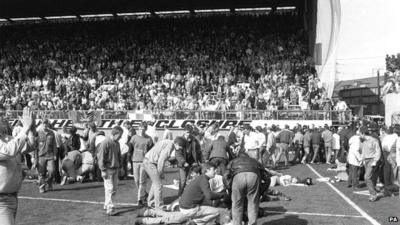 Fans being attended to after severe crushing at Hillsborough - photo dated 15/04/1989