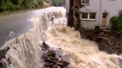 Flood waters wreck house in Scotland