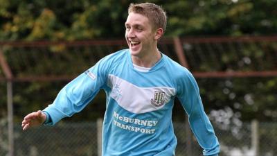 Alan Teggart celebrates scoring the winning goal against Glenavon