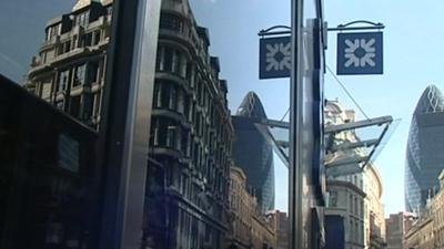 London headquarters of RBS, with sign reflecting in windows