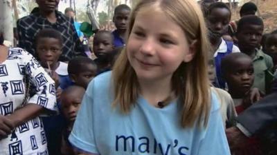 Martha Payne with children in Malawi