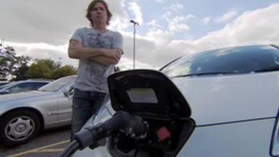 Dale Vince from Ecotricity with electric car