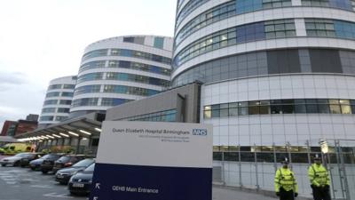 Police outside Queen Elizabeth Hospital in Birmingham