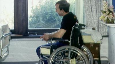 A man in a wheelchair (generic)