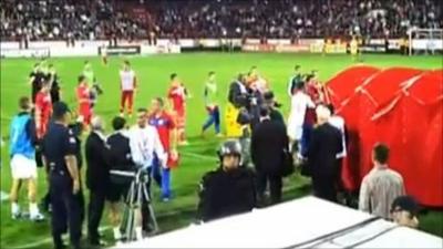 Serbian and English players clash