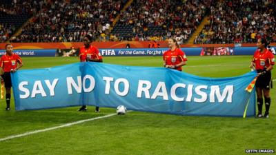 Say no to racism banner