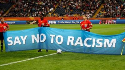 Say no to racism banner