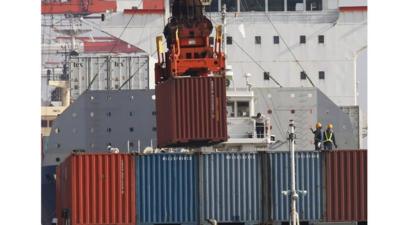 Loading cargo at a port in Tokyo