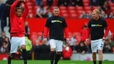 Manchester United's Rio Ferdinand, Wayne Rooney and Paul Scholes