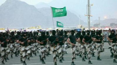 Saudi security forces marching