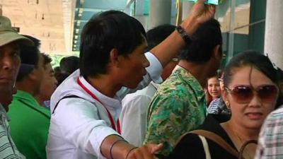 Passengers arriving at Yangon airport