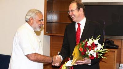 Narendra Modi and James Bevan