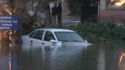 A car in an flooded street in Turkey