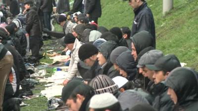 Muslims in Moscow prayer outside in rain