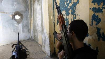 Member of Hezbollah with gun