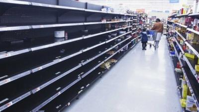 Empty shelves in New York supermarket