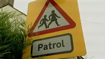 School crossing patrol road sign