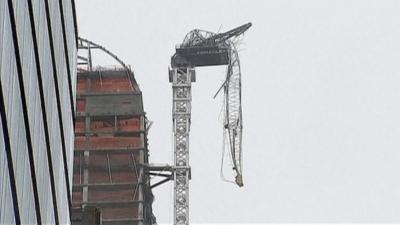 Crane hangs over New York