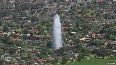 Water shooting into the air in Melbourne, Australia after a pipe burst.