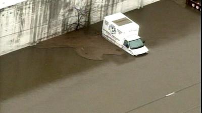 Aerial view of partially submerged van