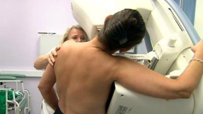 Woman having mammogram