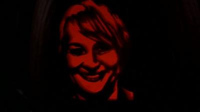 Face of Louise Minchin carved into pumpkin