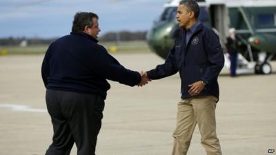 President Barack Obama is greeted by New Jersey Gov. Chris Christie upon his arrival at Atlantic City Int Airport