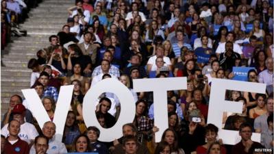 Campaigners hold up Vote sign