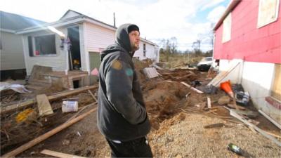 Michael Terrasi outside his damaged home