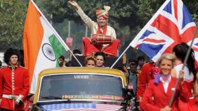 British business tycoon Richard Branson plays a traditional Indian drum during a photo opportunity parade in Mumbai